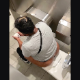 A daring cameraman records a big, black woman in a adjoining public restroom stall taking a noisy, wet shit into a toilet. She even apologizes to him because of the loud noises she makes. Vertical format HD video. 144MB, MP4 file. Over 8.5 minutes.